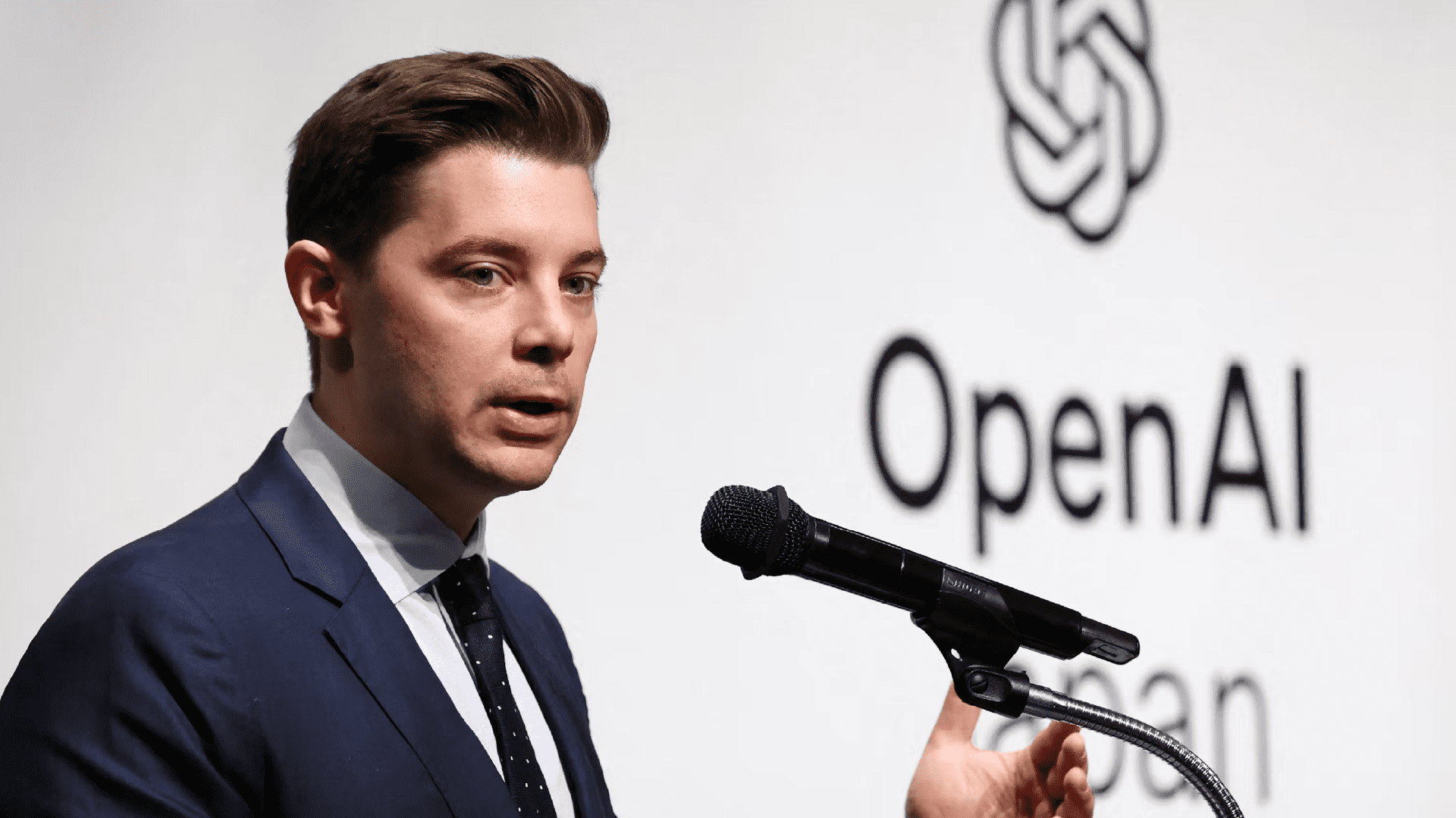 OpenAI's Brad Lightcap declares AI essential for coders at CISCO AI Summit 2025, emphasizing its transformative role and the challenges of transparency, bias, and over-dependence.
