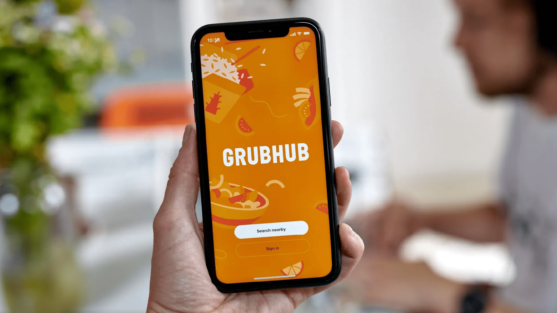 Grubhub security breach notification on a smartphone screen, symbolizing compromised user data.